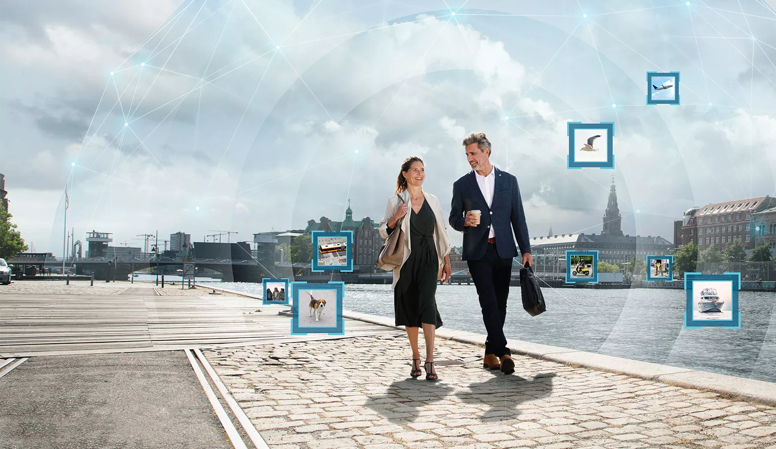 Oticon technology demonstrated with a couple walking through a city