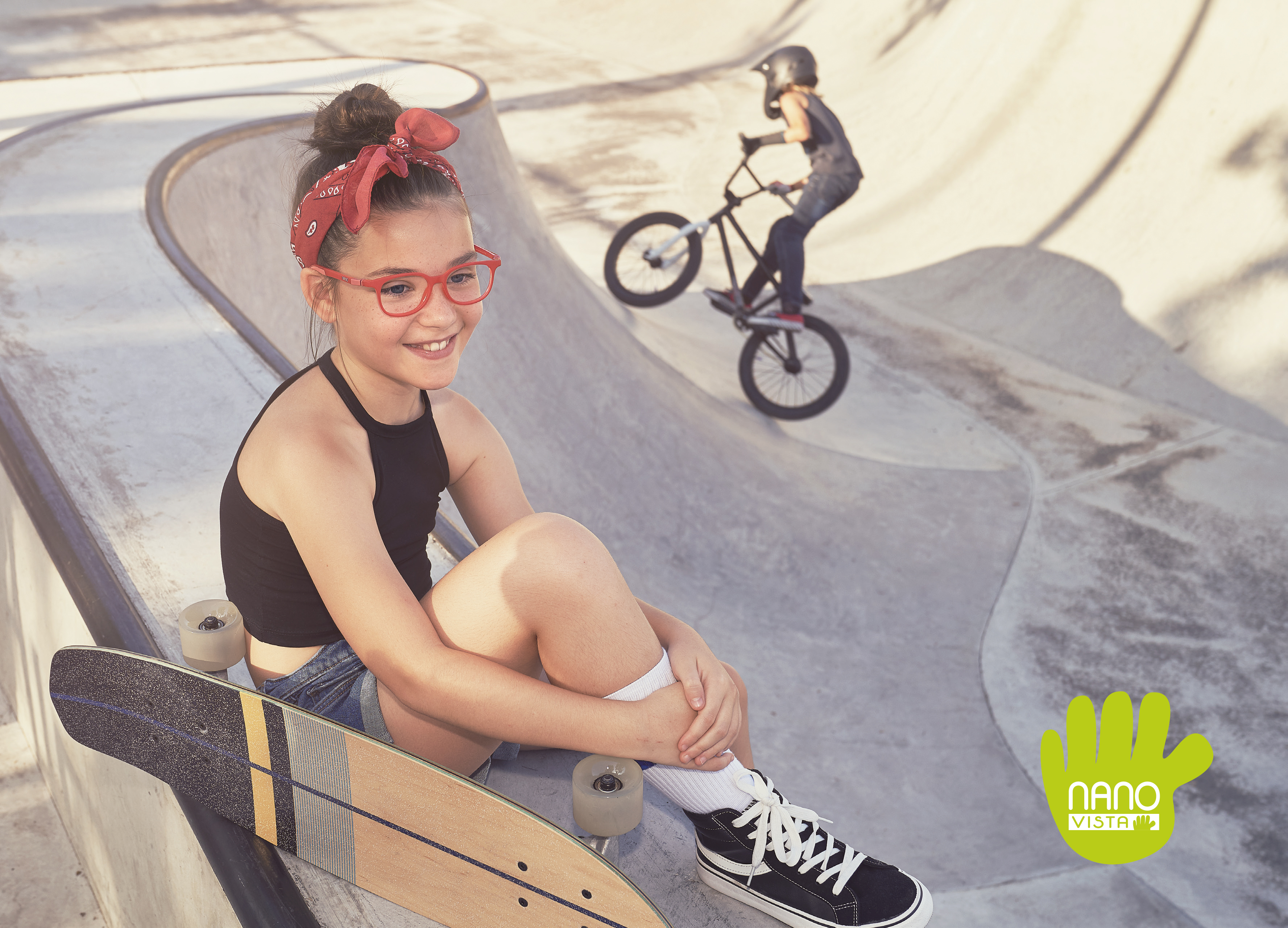 Nano Vista campaign poster for indestructible glasses with a kid at a skatepark.