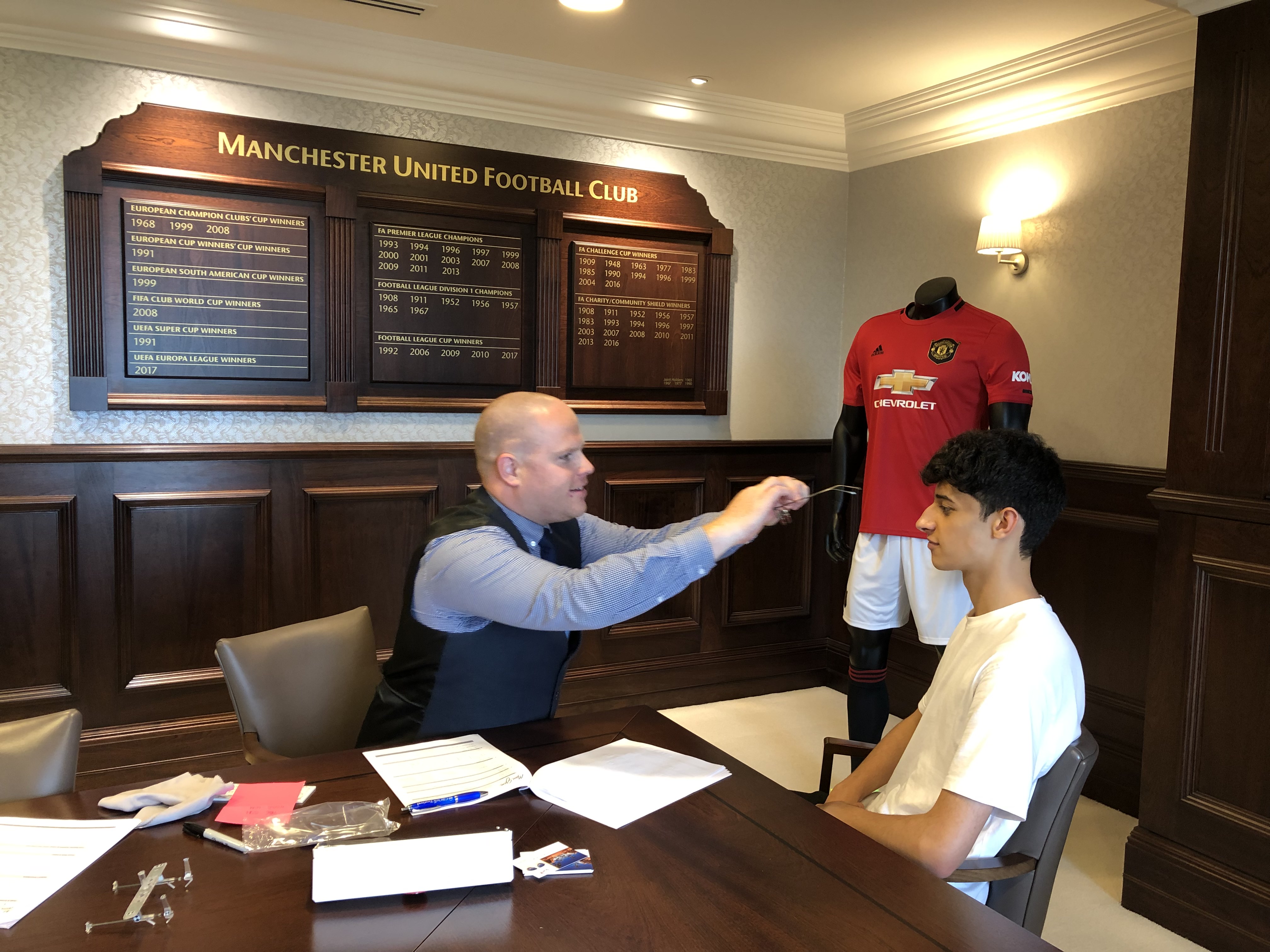 Fitting glasses at Man U