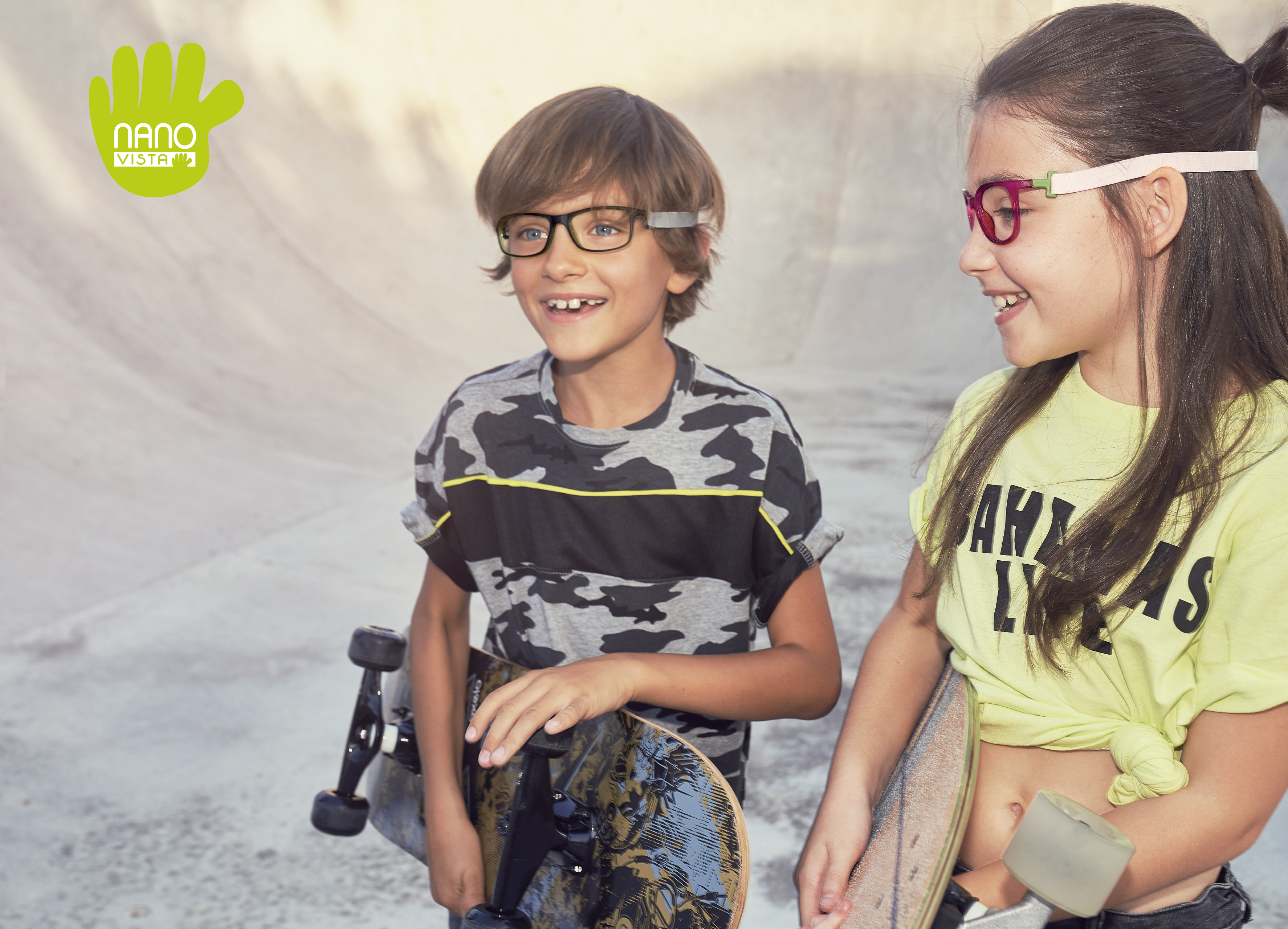 Nano Vista unbreakable frames for kids campaign poster with 2 kids wearing glasses and holding a skateboard.