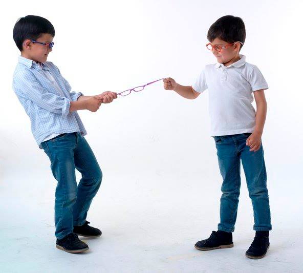 Two children playing with Nano Vista glasses.