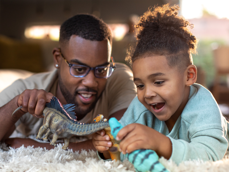 A father playing with his son.