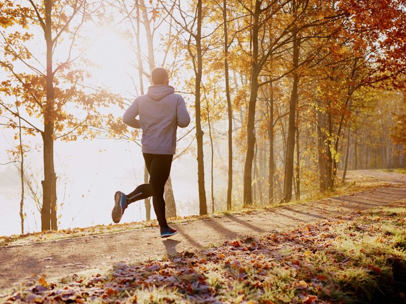 man jogging on cold autumn day