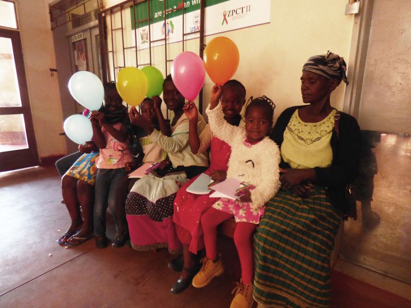 African children holding balloons