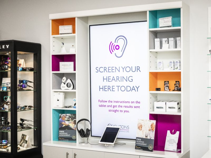 "Screen Your Hearing Here today" poster in practice