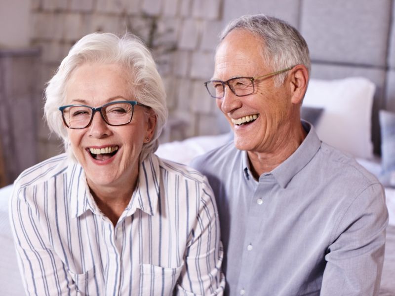 Man and woman laughing