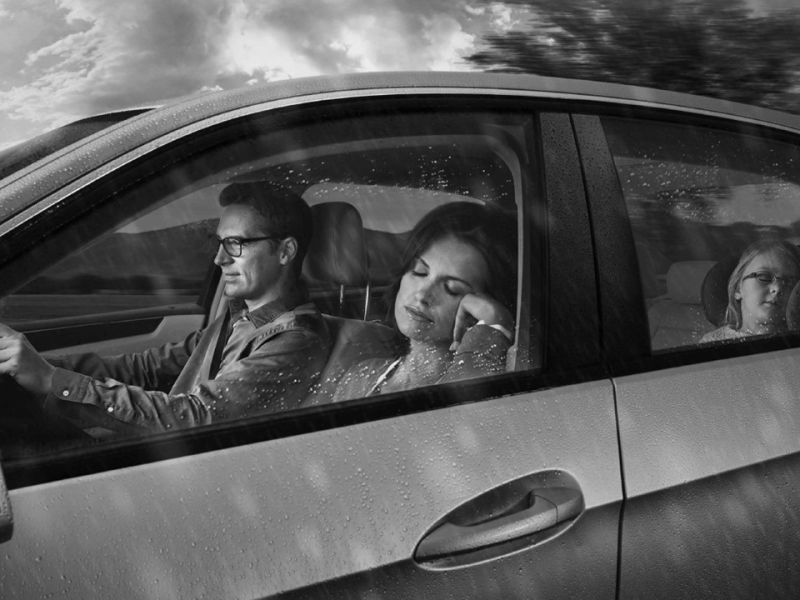 Family travelling in car