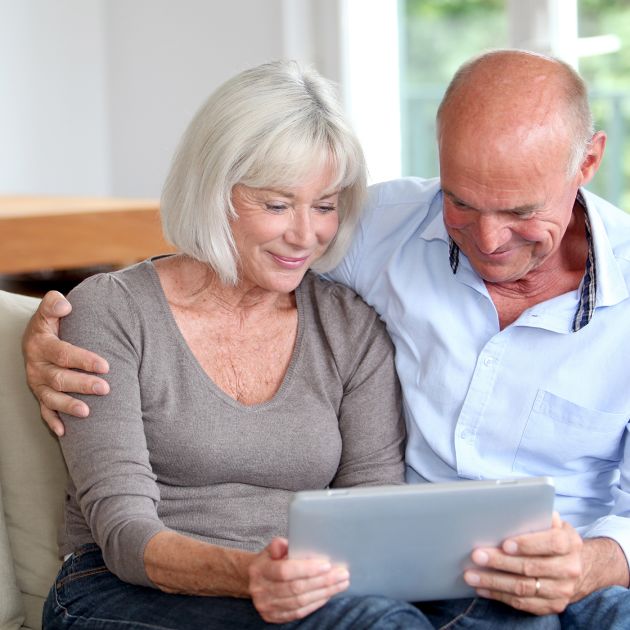 couple looking at a tablet