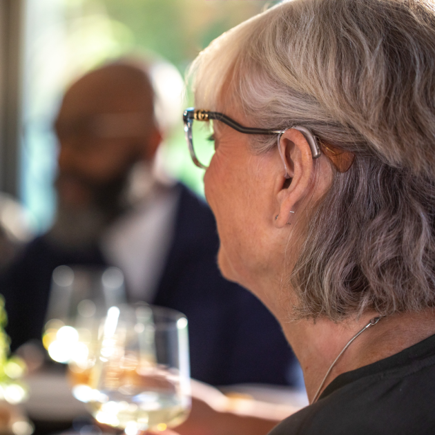 woman wearing hearing aids