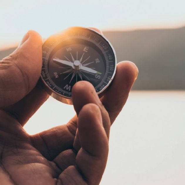 compass in hand