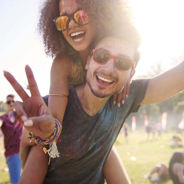 Couple at festival in sunglasesses