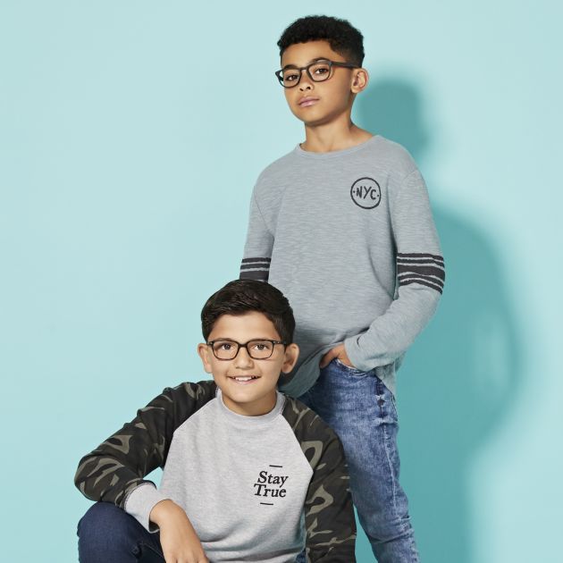 Rockstar banner featuring two child models wearing glasses against a light blue background.