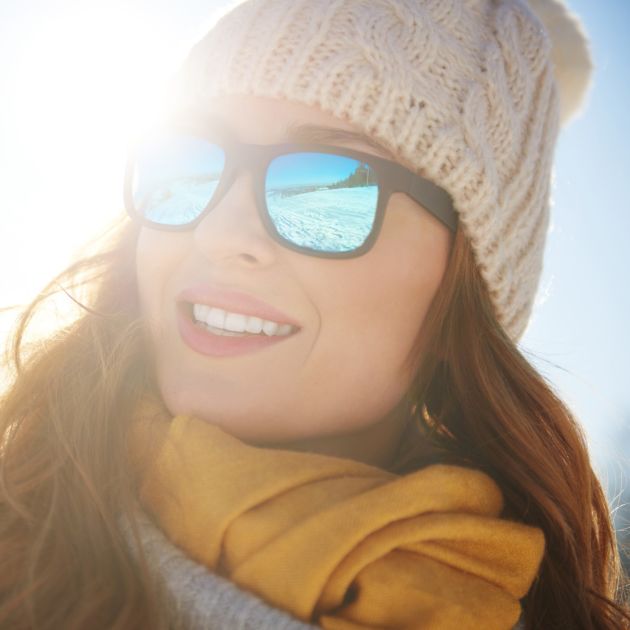 Woman in winter sunglasses