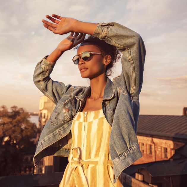 A woman wearing Eco sunglasses.