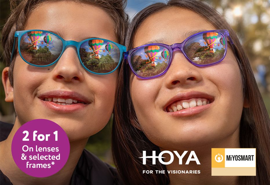 A boy wearing blue glasses, and a girl wearing purple glasses