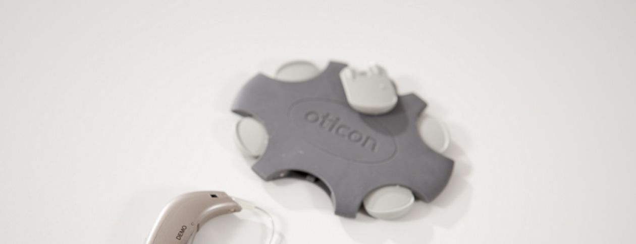 What's the difference between hearing aids and amplifiers?