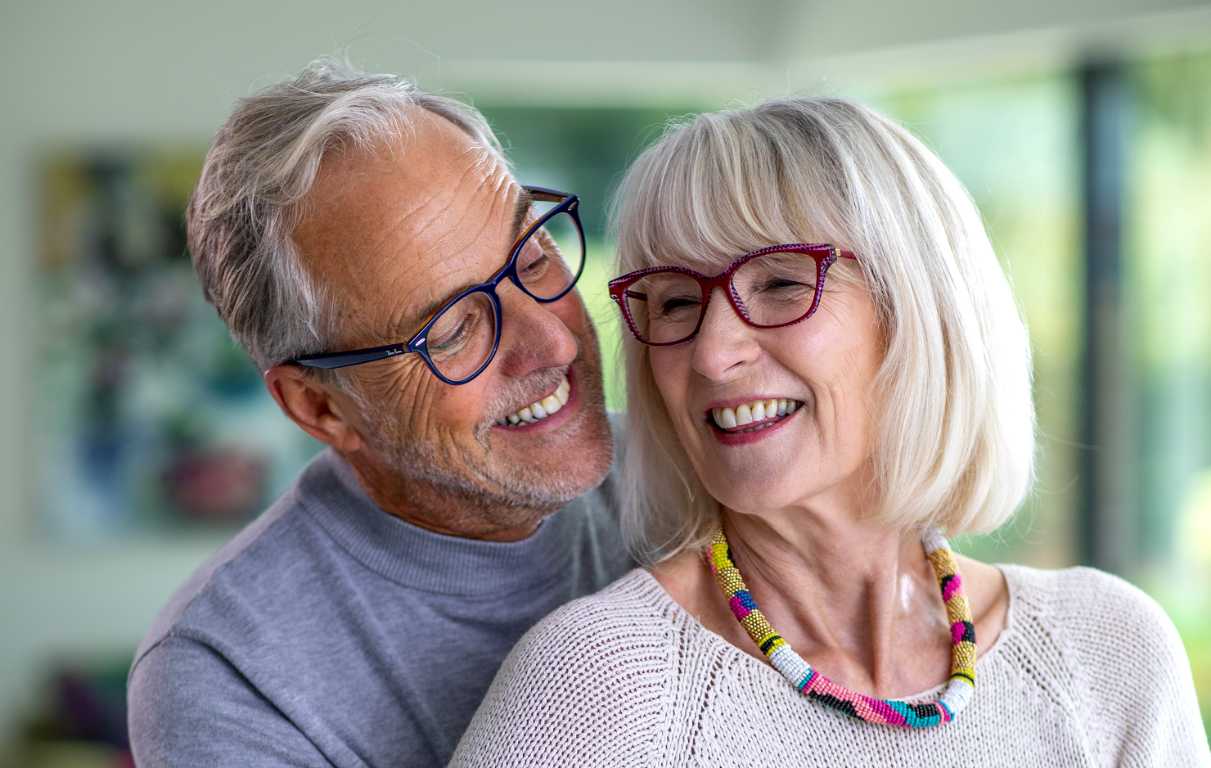 older couple together in kitchen