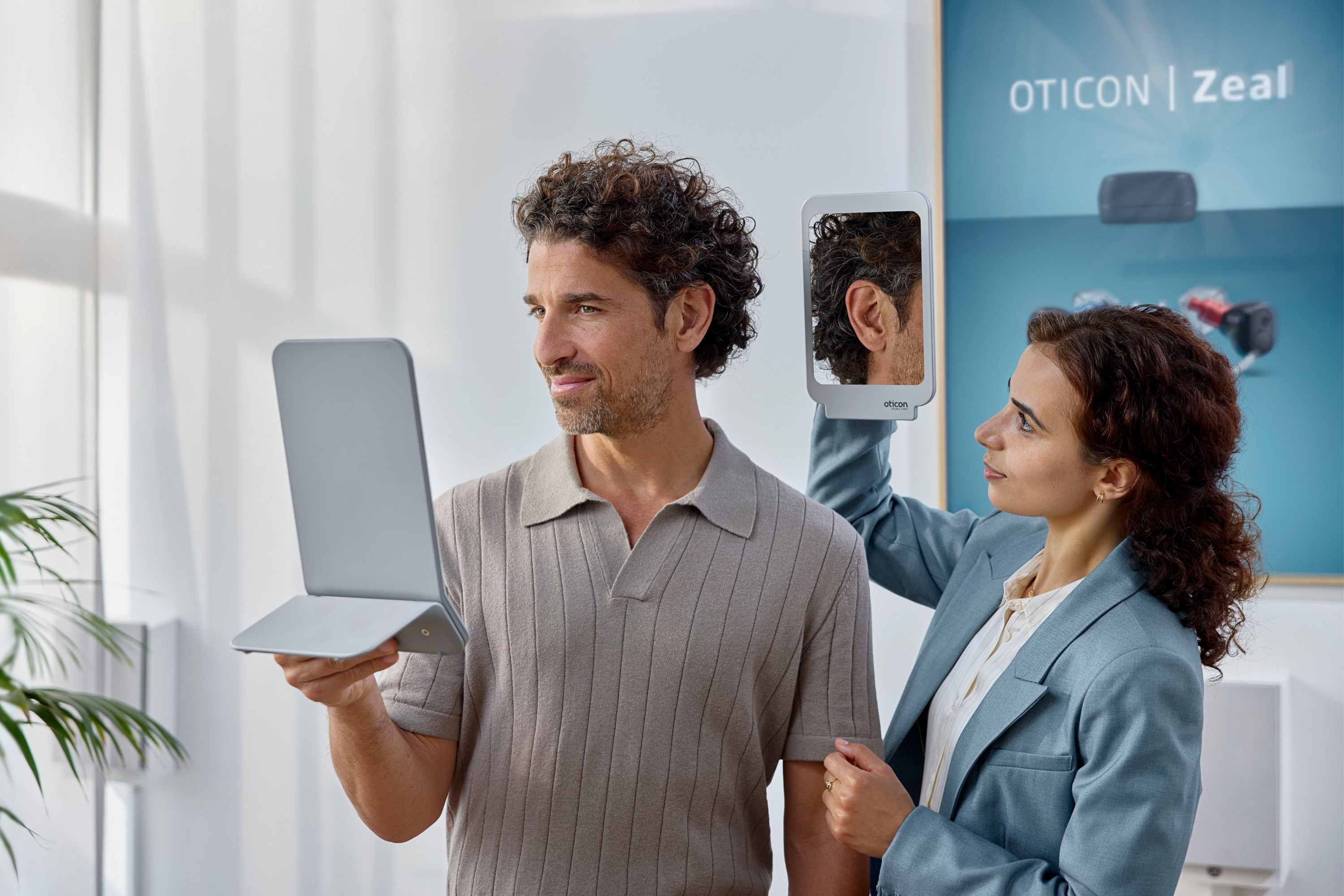 A man having a hearing aid fitting appointment.
