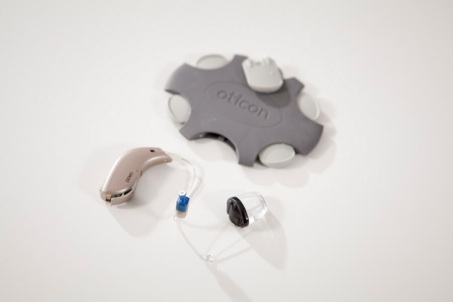 What's the difference between hearing aids and amplifiers? The