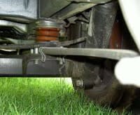 compressed spring assistor