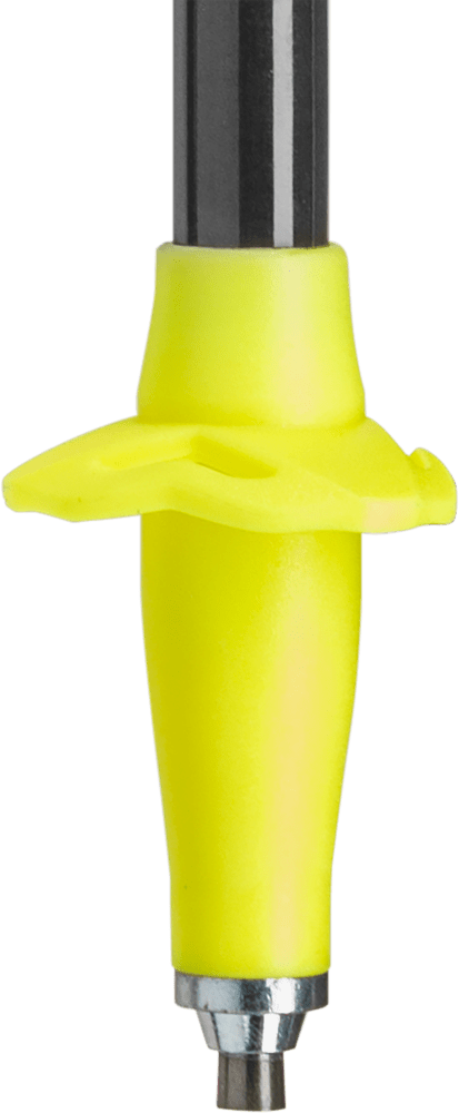 Yellow trekking pole basket with metal tip attached to the pole shaft; short section of the black shaft visible.