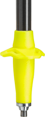Ski pole tip with yellow plastic basket and metal carbide point attached to a black shaft, close-up