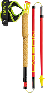Ski pole with cork grip and padded wrist strap, shown vertically; red carbon shaft with black and yellow accents and small yellow basket