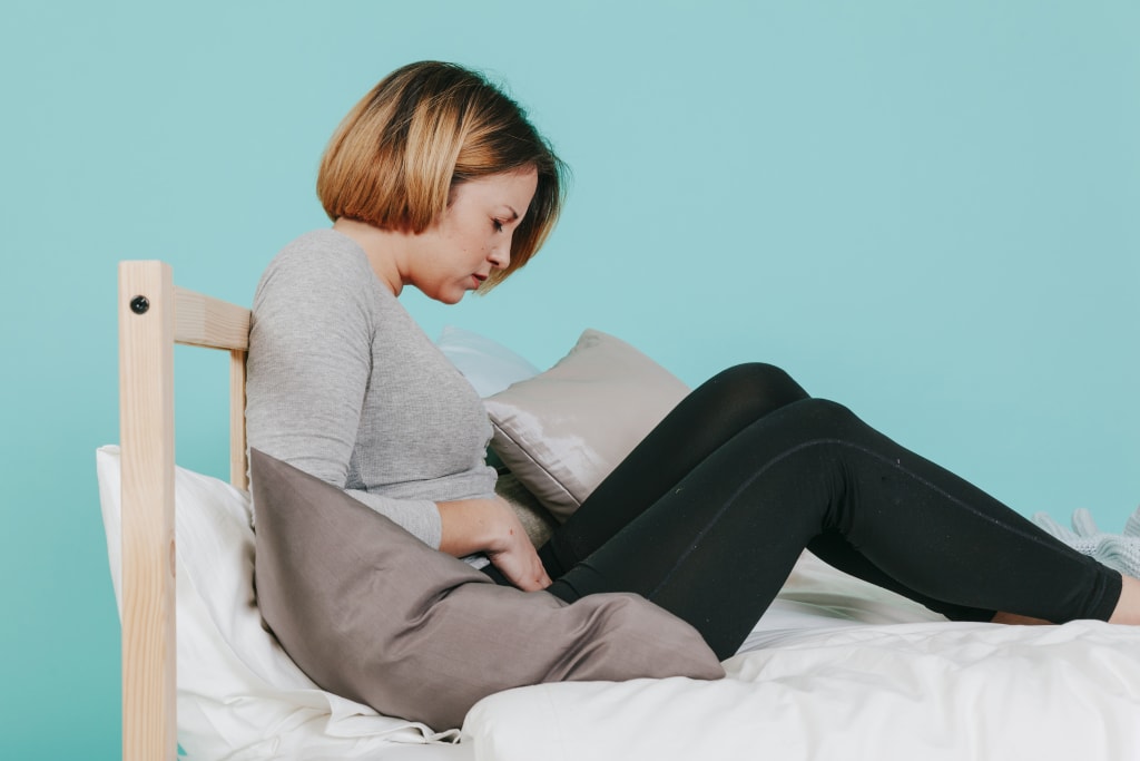 affections femme souffrande d'affection urinaires et les maladies métaboliques