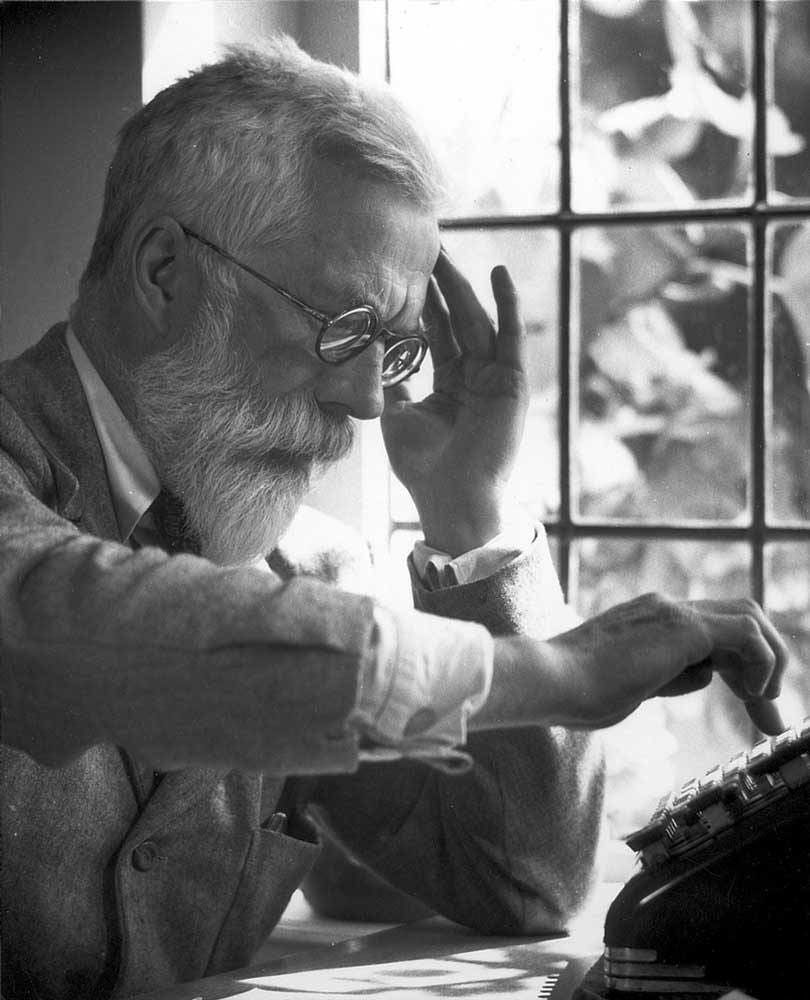 Picture of Ronald Fisher sitting and smoking