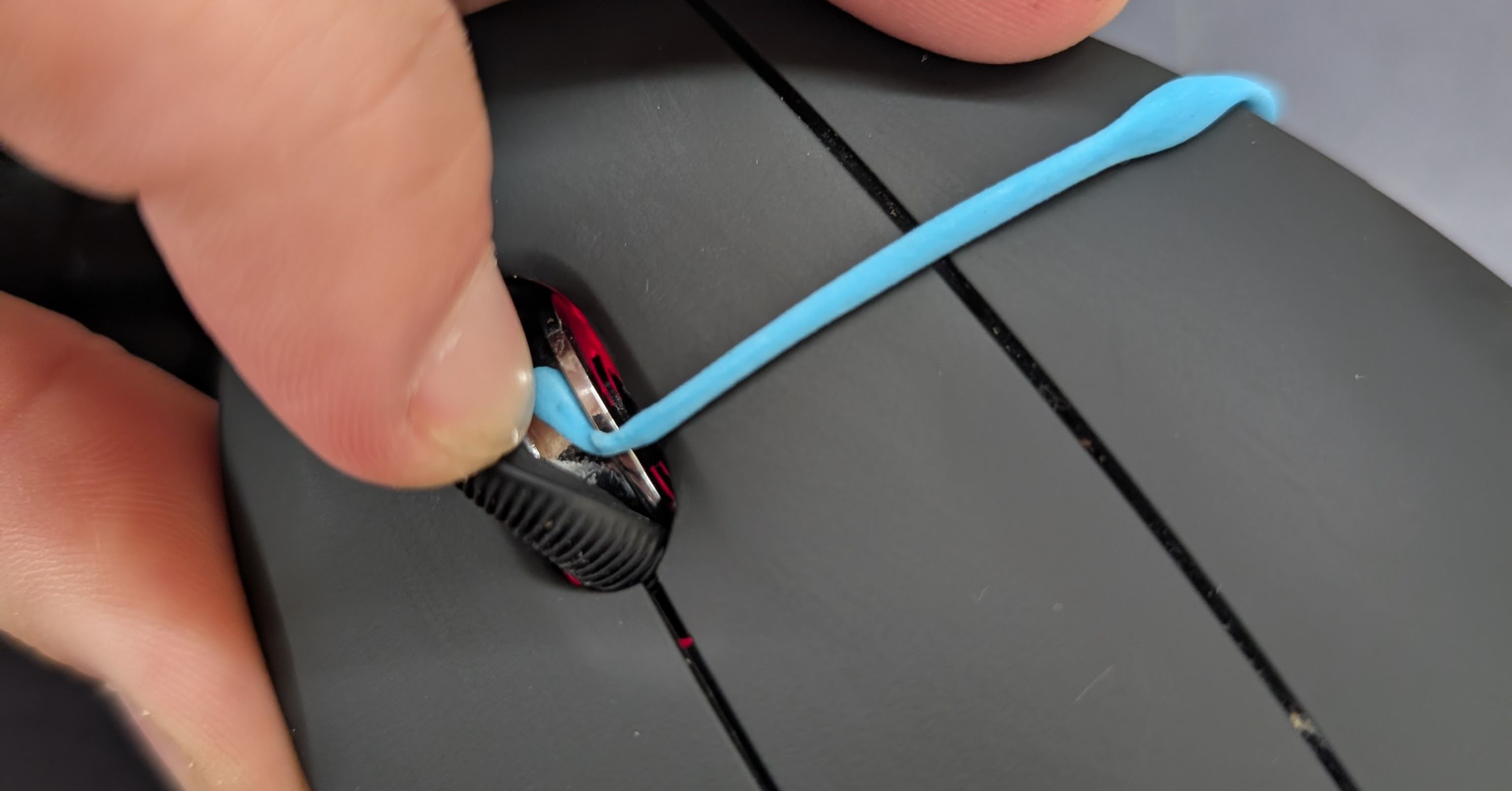 Fixing a Loose Mouse Wheel With Putty — LessWrong