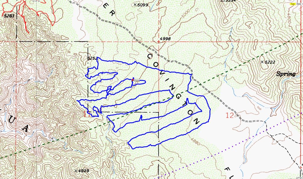 A topographical map overlaid with a GPS track. The GPS path evenly and methodically covers a small area.