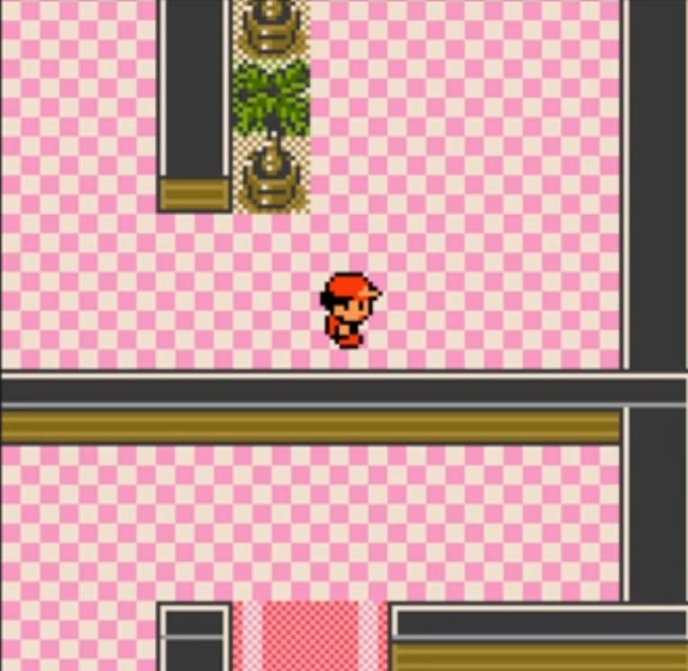 The dark pink carpet leads to the elevator. The elevator itself has its own screen which is more obviously an elevator, but there's no clear "elevator door" sprite as an entrance.