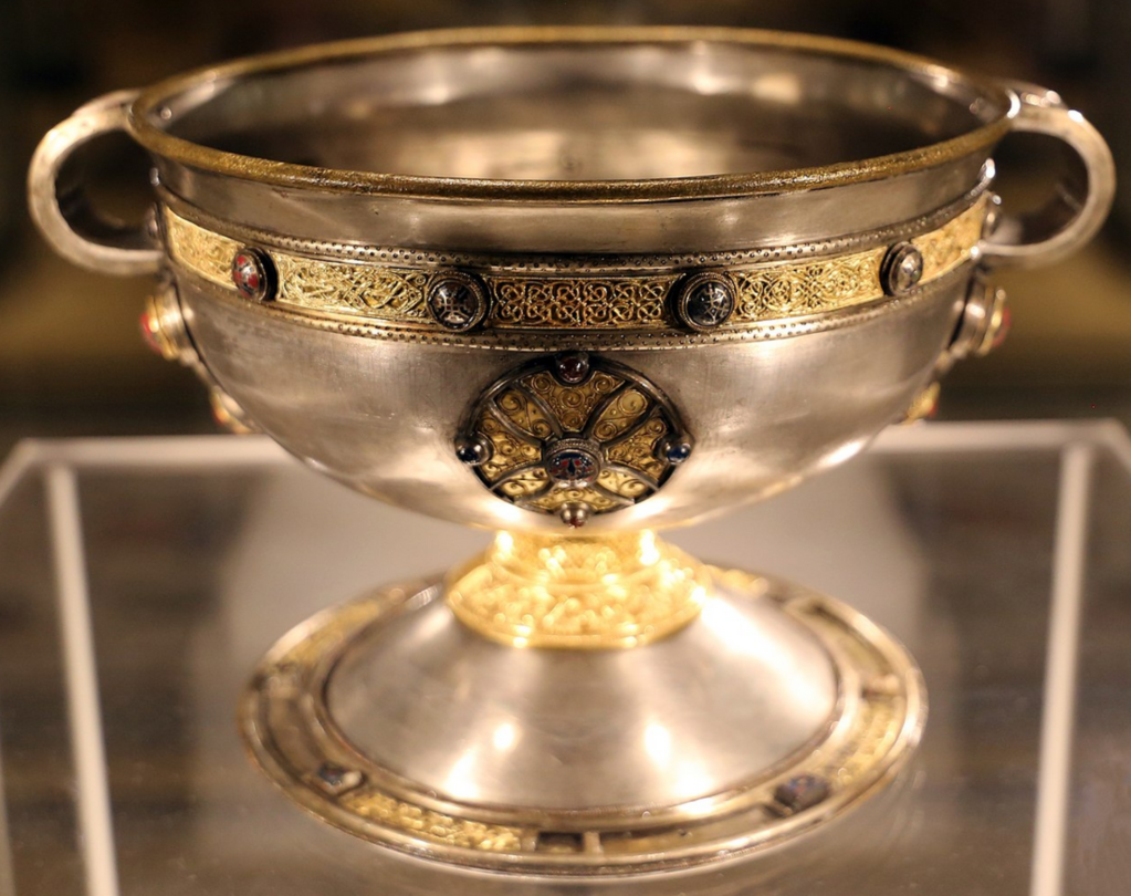 Photo of a richly decorated old silver cup.