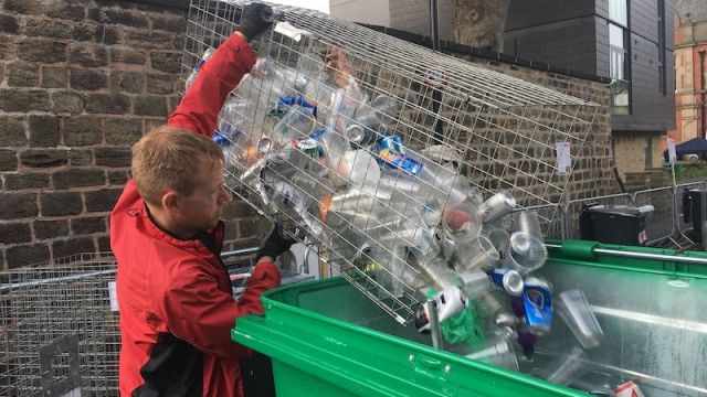 Rob from Zero Waste Leeds emptying a recycling bin at a recent event