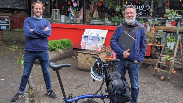 Stuart Clarke from Leeds Digital Festival donating laptops to DAWY at Hyde Park Book Club