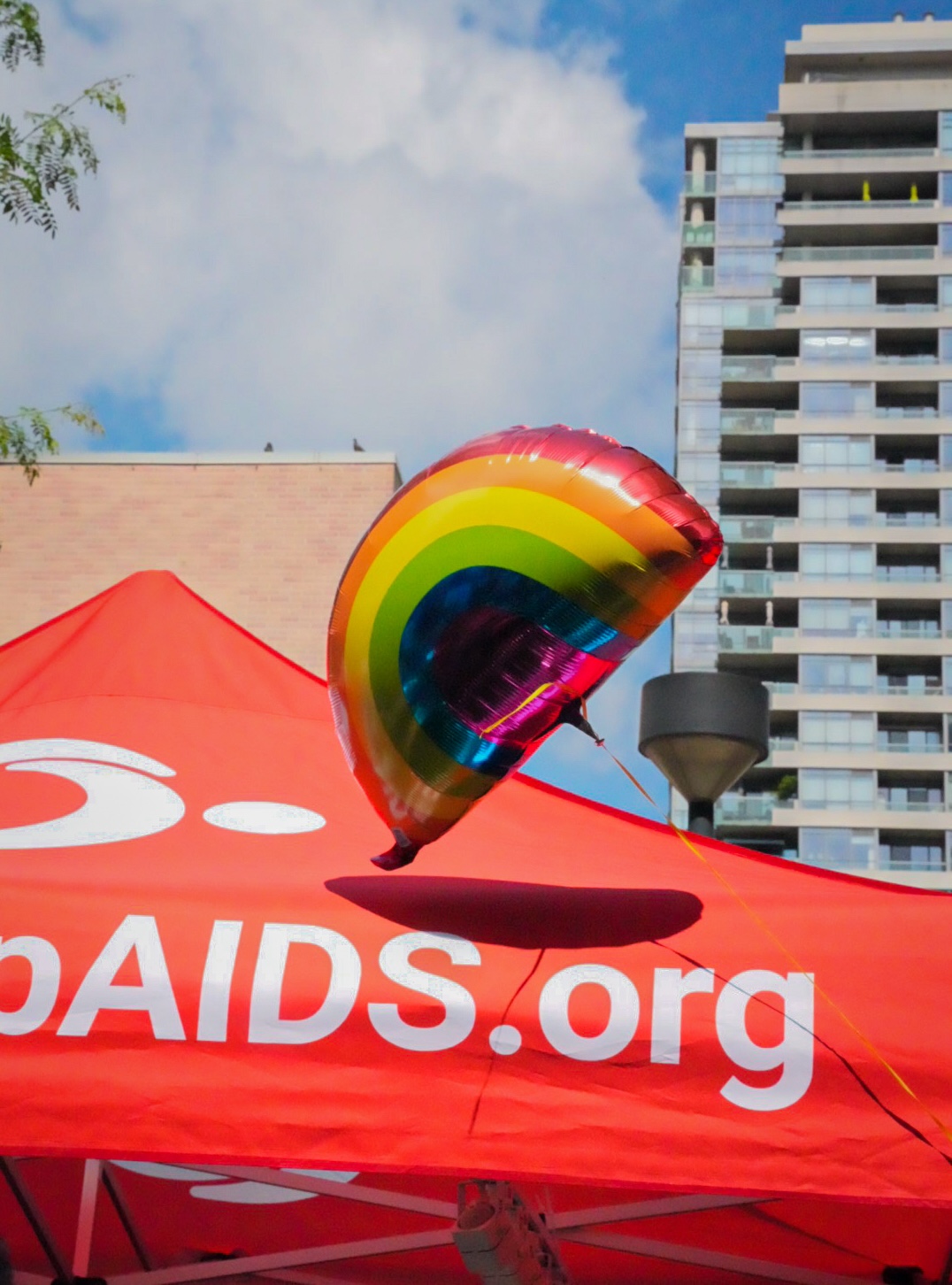 A picture of a rainbow balloon at the LetsStopAIDS booth during the Pride event.
