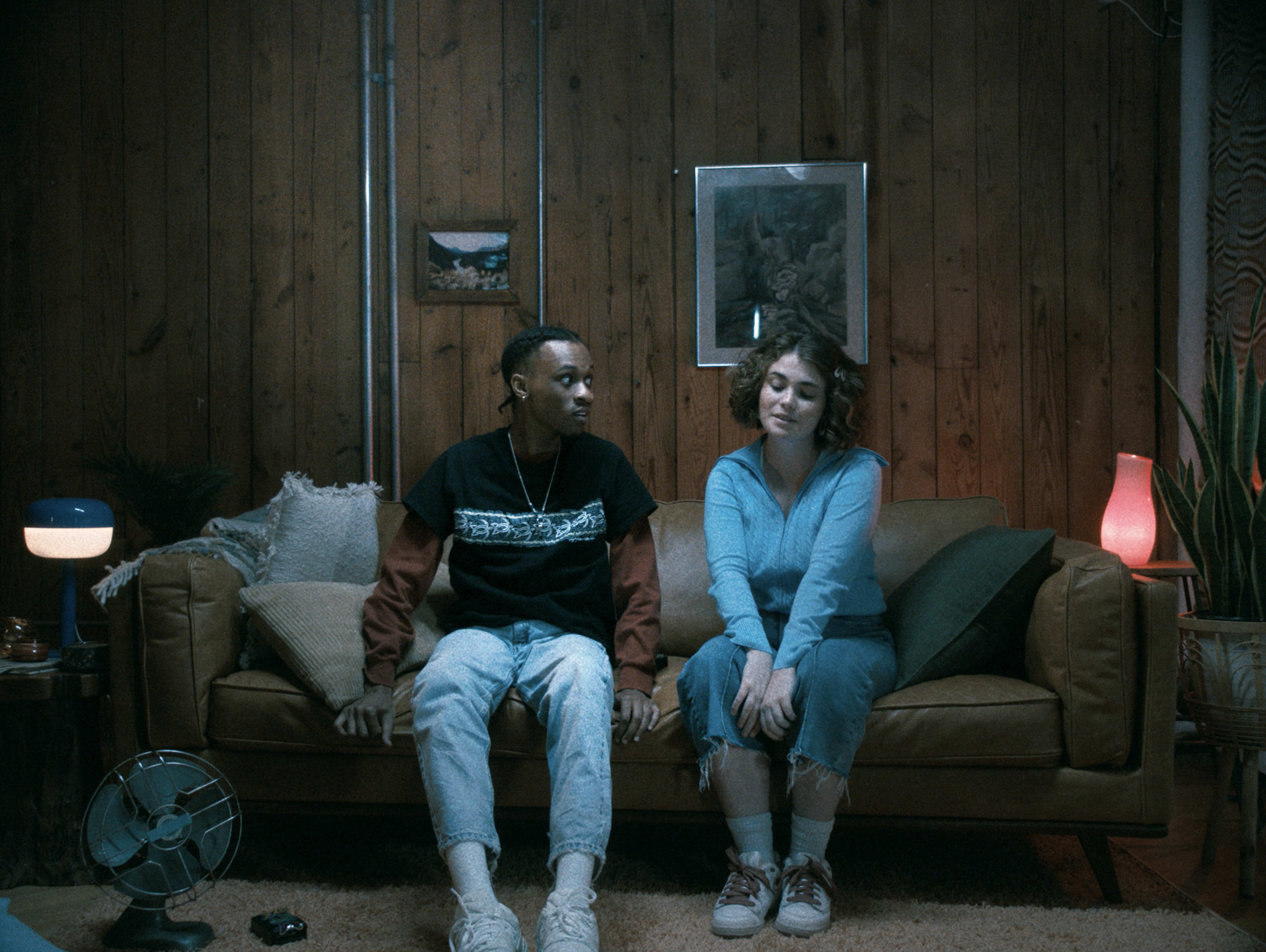 Image from the Sex Lives Report 2024 Video Campaign, showing a girl and a boy having an intimate conversation on the couch