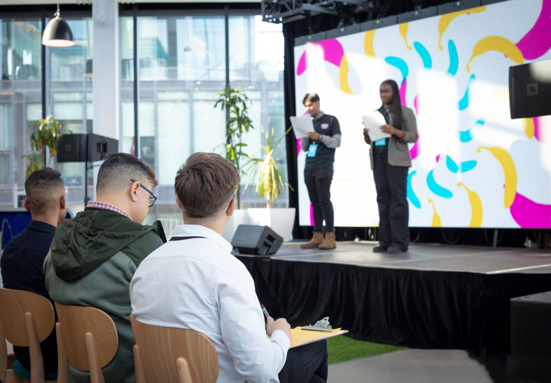 NoTimeToWait Year 3 at Spaces venue in Toronto, showing two youth coordinators kicking off the event