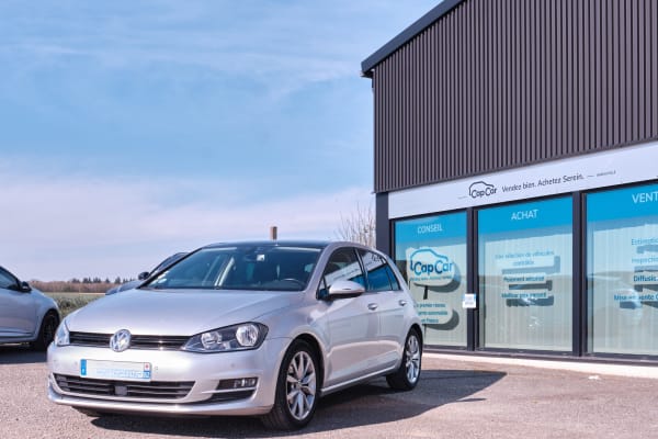 Vendre sa voiture via une agence automobilière : guide complet 2026