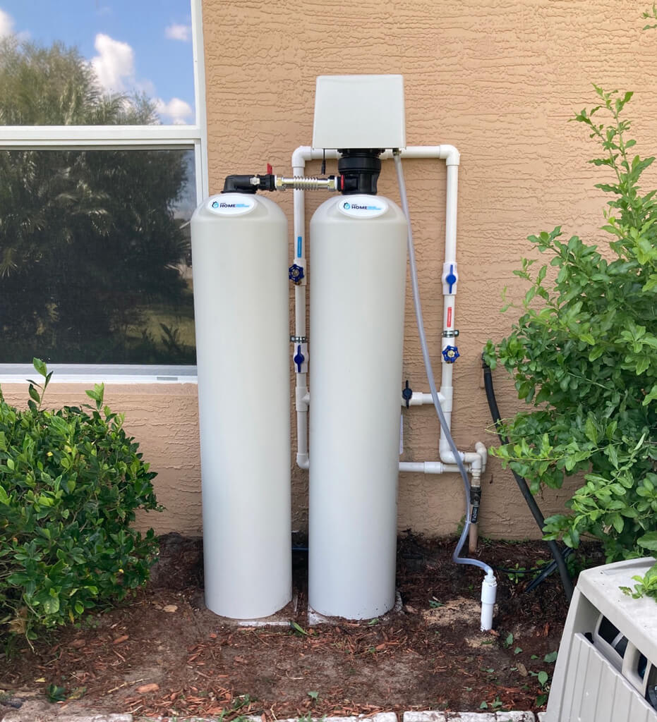 cto-conditioner-gallery-1 water filtration system setup on the outside of a home