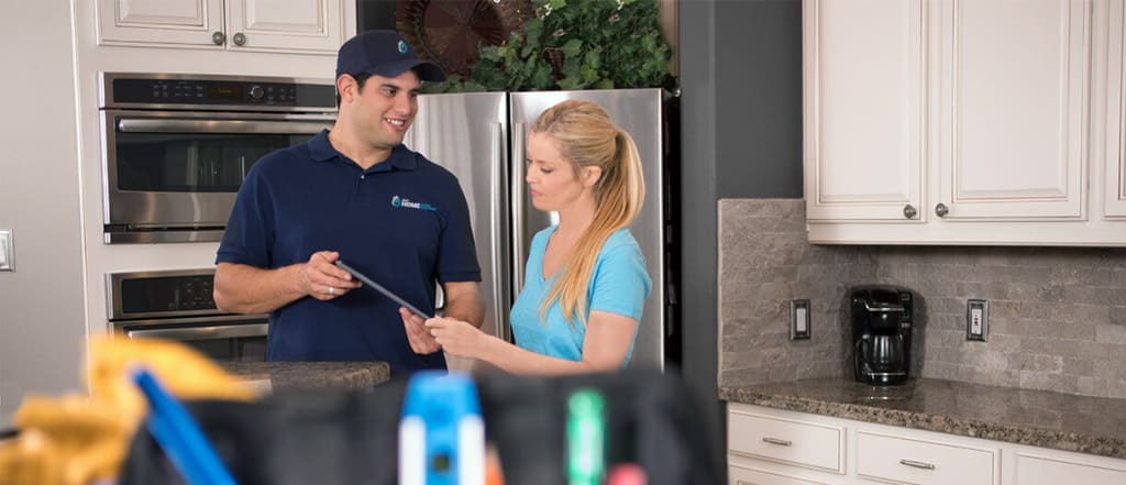 are-water-solutions-right-for-me a water solutions expert assisting a home owner