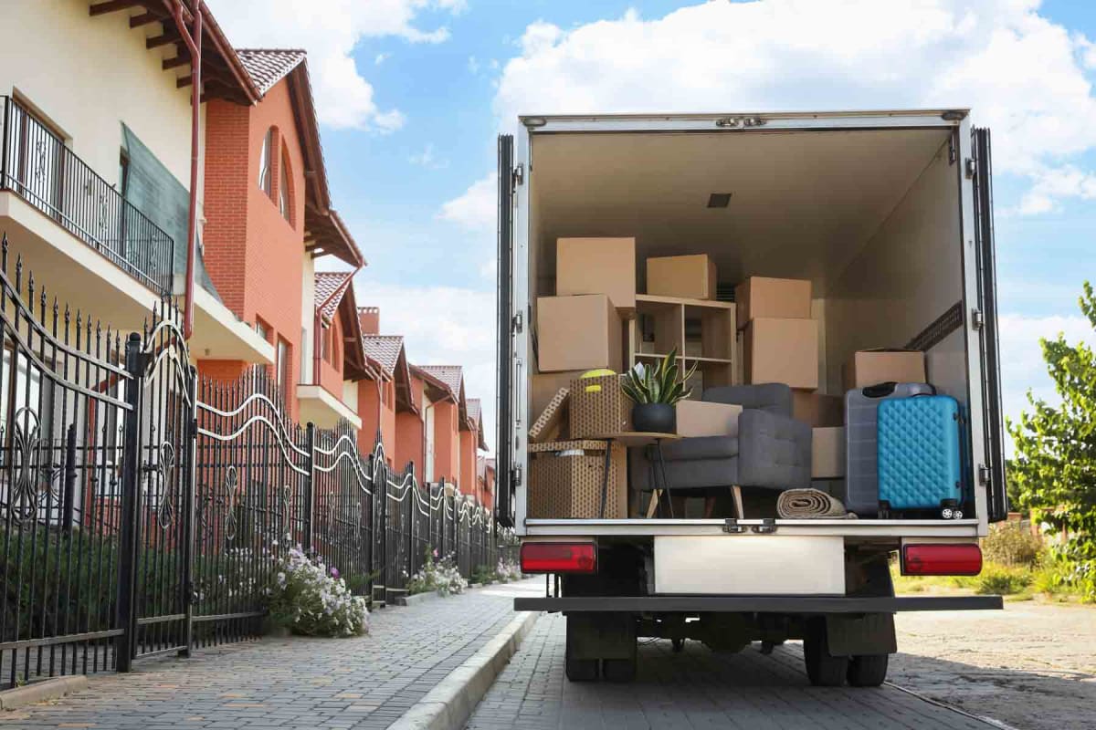 Homeguide Moving Truck Loaded With Boxes And Furniture 