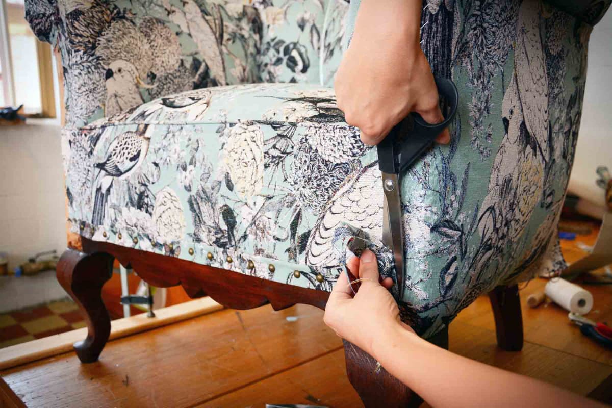 How much does it cost to reupholster a chair?