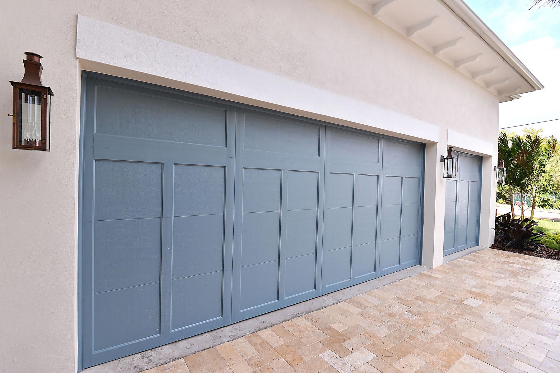 How much does it cost to paint a garage door?