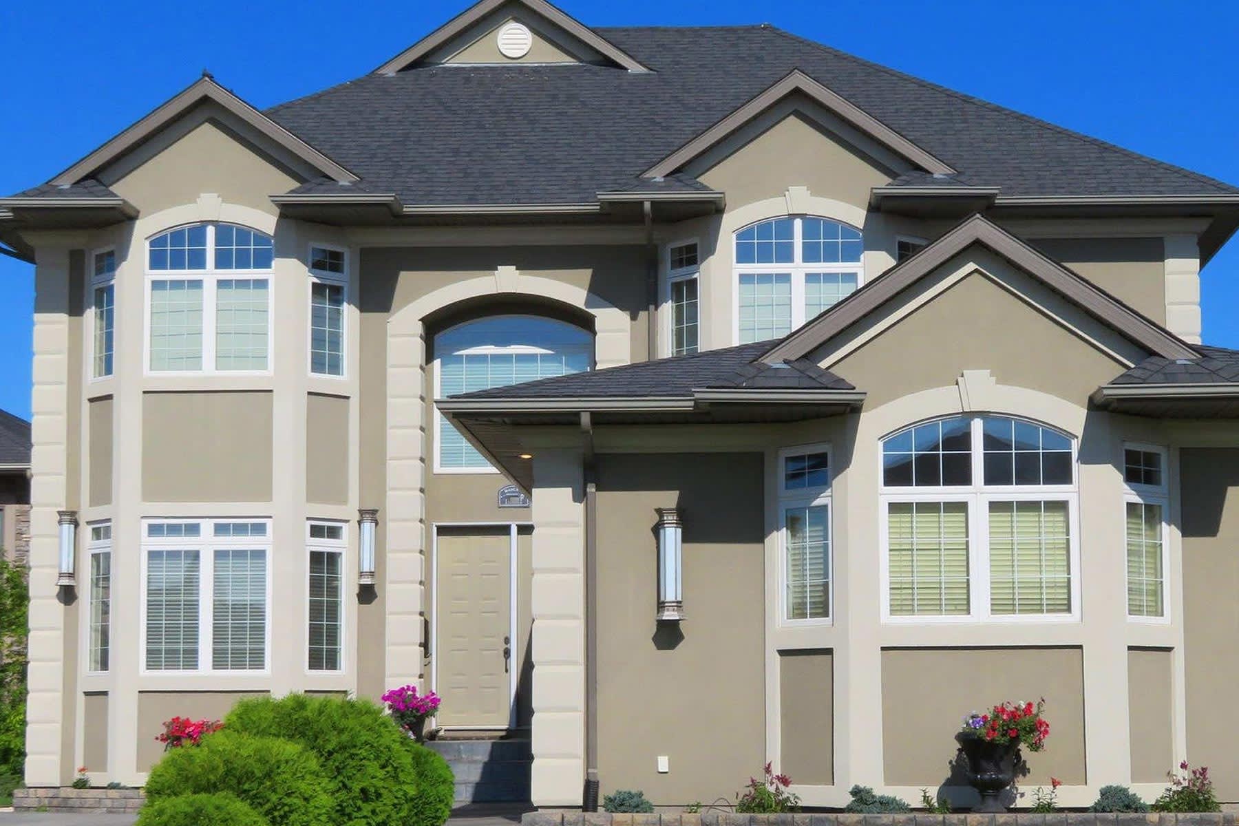 How much does it cost to paint a stucco house?