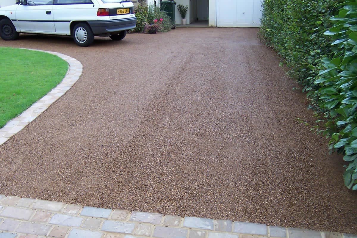 How much does a chip seal or tar and chip driveway cost?