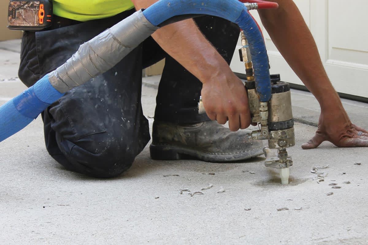 How much does concrete leveling or mudjacking cost?