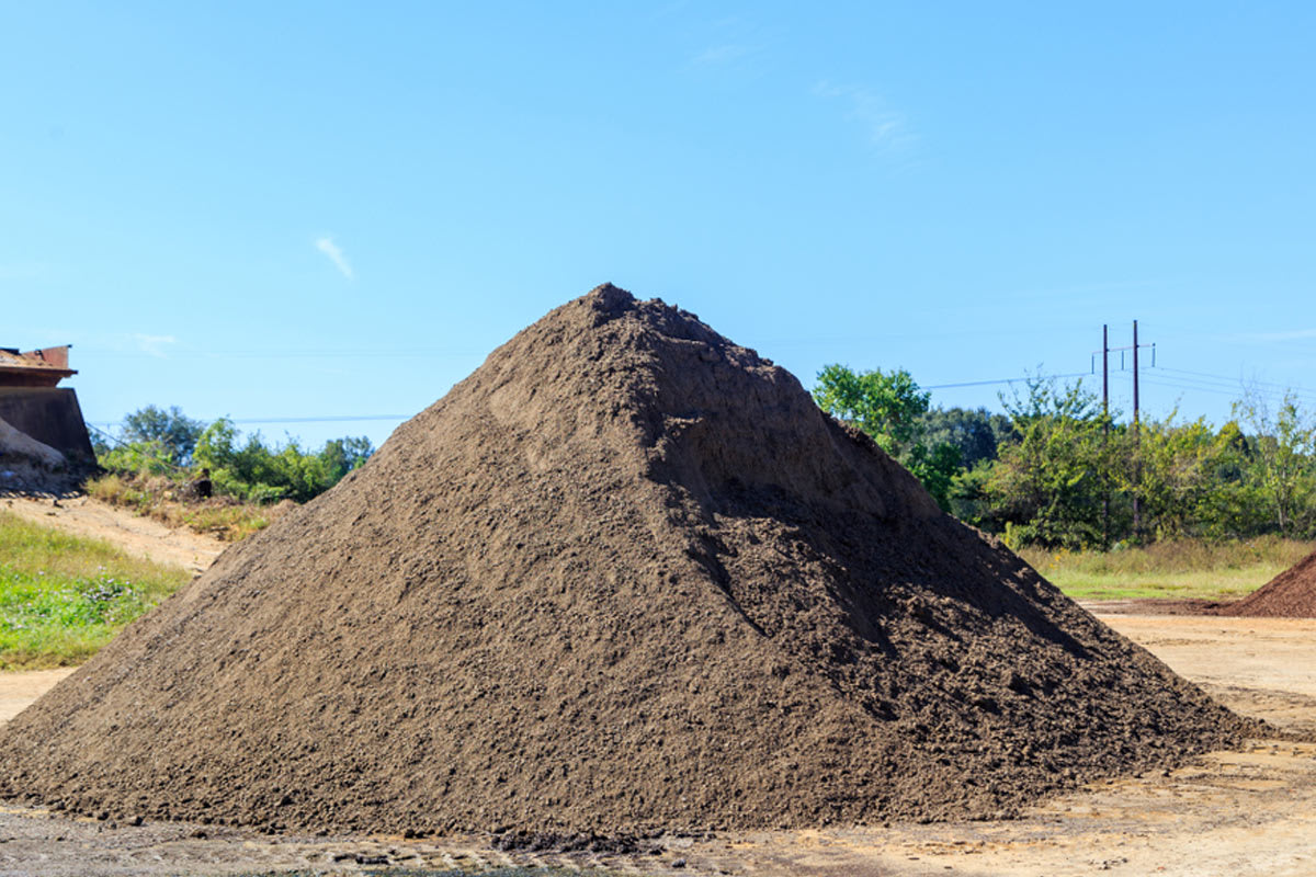 How much does it cost to deliver topsoil, fill dirt, or sand?