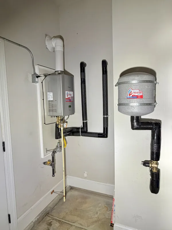 REP160 Rinnai tankless water heater with new PRV and expansion tank in the garage