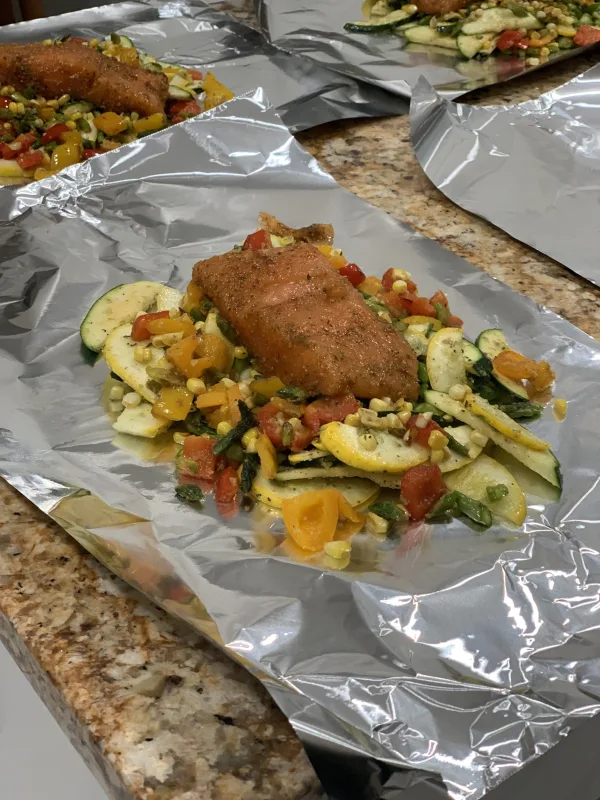 Pocket salmon on a bed of veggie Melody